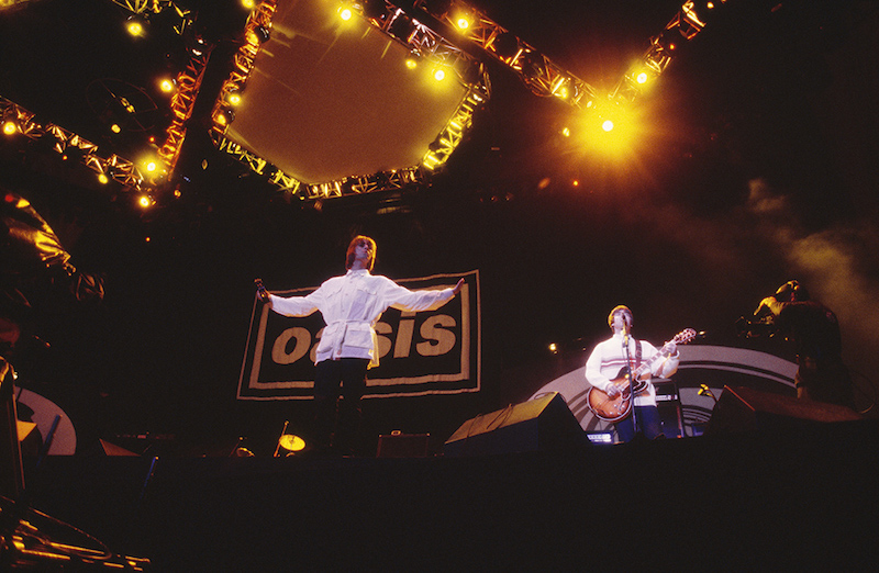 Oasisの伝説の一夜を、劇場で追体験！『オアシス：ライヴ・アット・ネブワース 1996.8.10』来場者プレゼント配布決定
